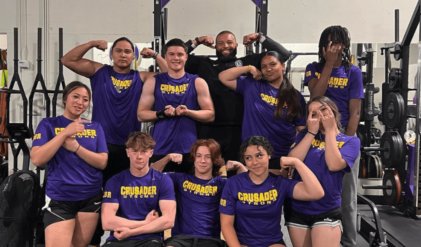 Group of coaches and athletes from Archbishop Riordan